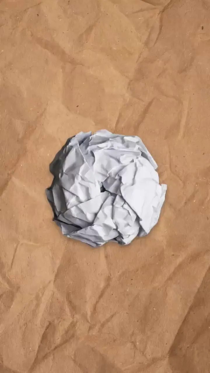 A portrait revealed as a folded paper animation
